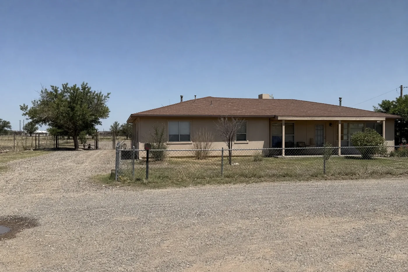 House painting Loving New Mexico Eddy County Pecos River corridor residential exterior